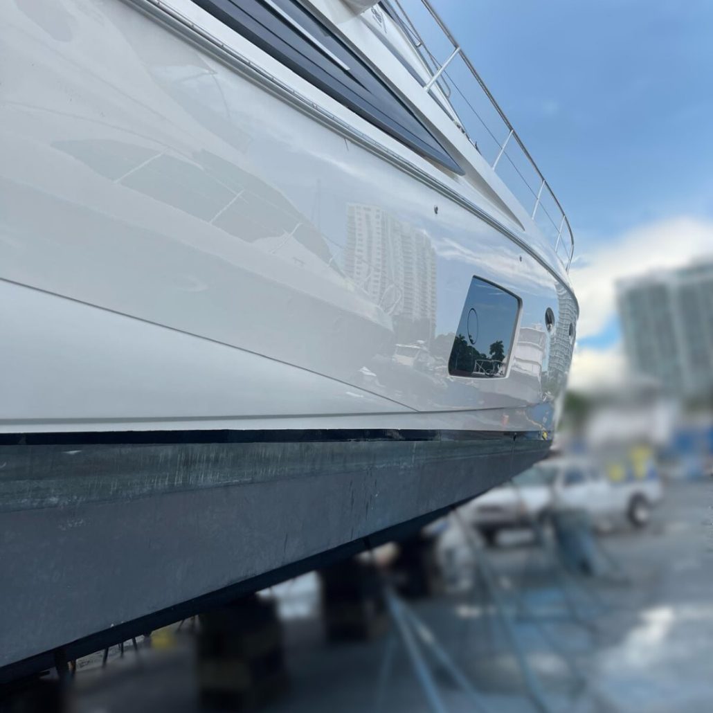 Princess 62-foot finished white hull side with reflections