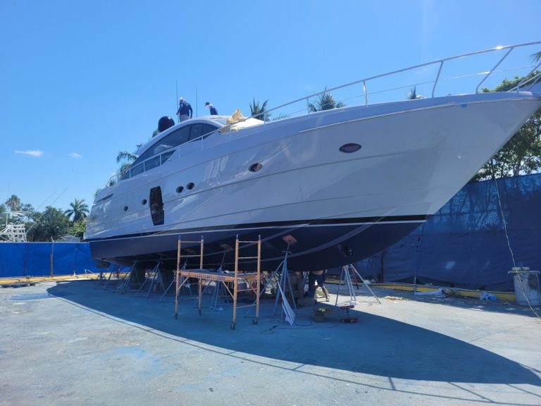 Pershing 64 full exterior profile ashore during the final stages of refinishing