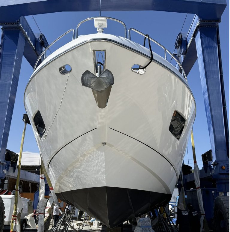 Sunseeker 74 bow finish photographed at the travel lift