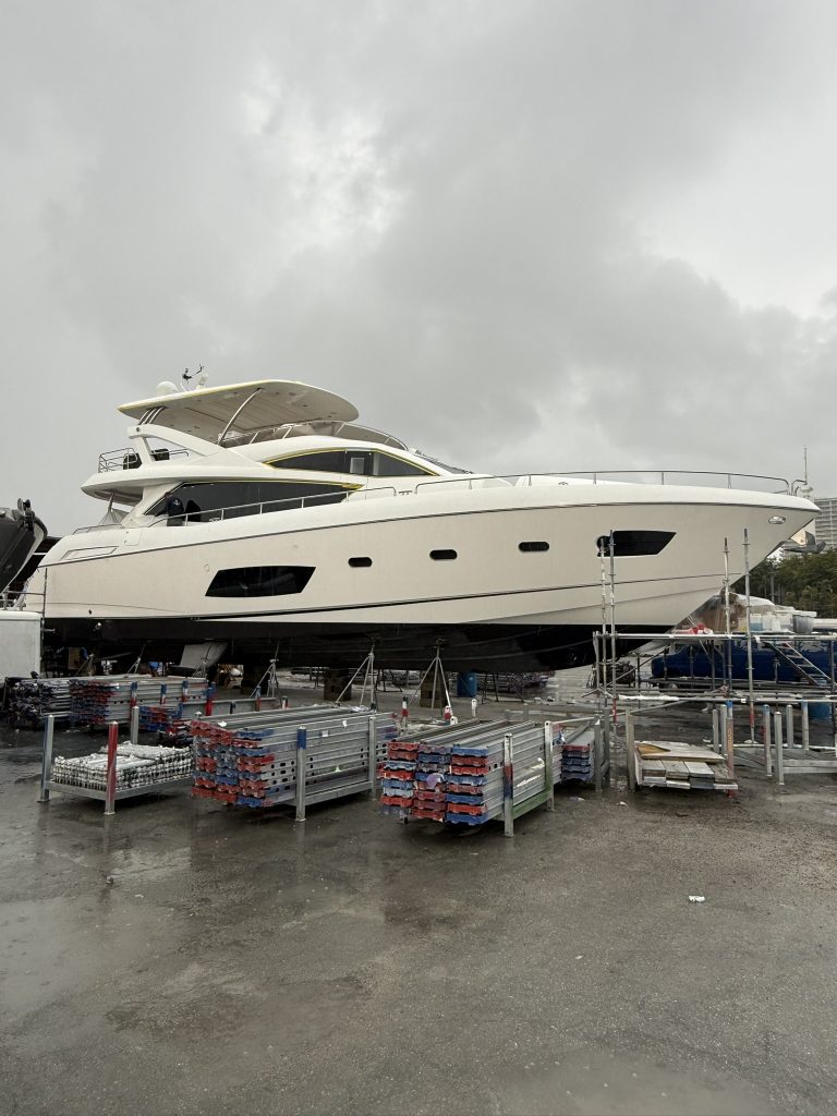 Sunseeker 74 exterior profile ashore with masking tape still visible around the glazing